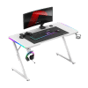 Huzaro Hero 2.5 beli gaming sto sa RGB osvetljenjem – kompletan setup sa monitorom, tastaturom i kontrolerima