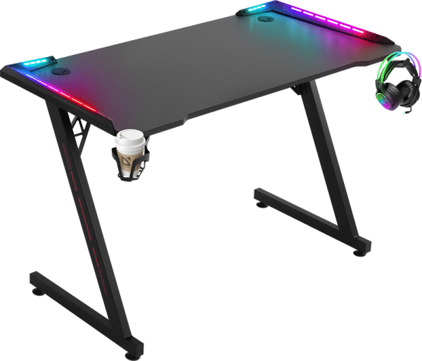 a black gaming desk with rgb lights